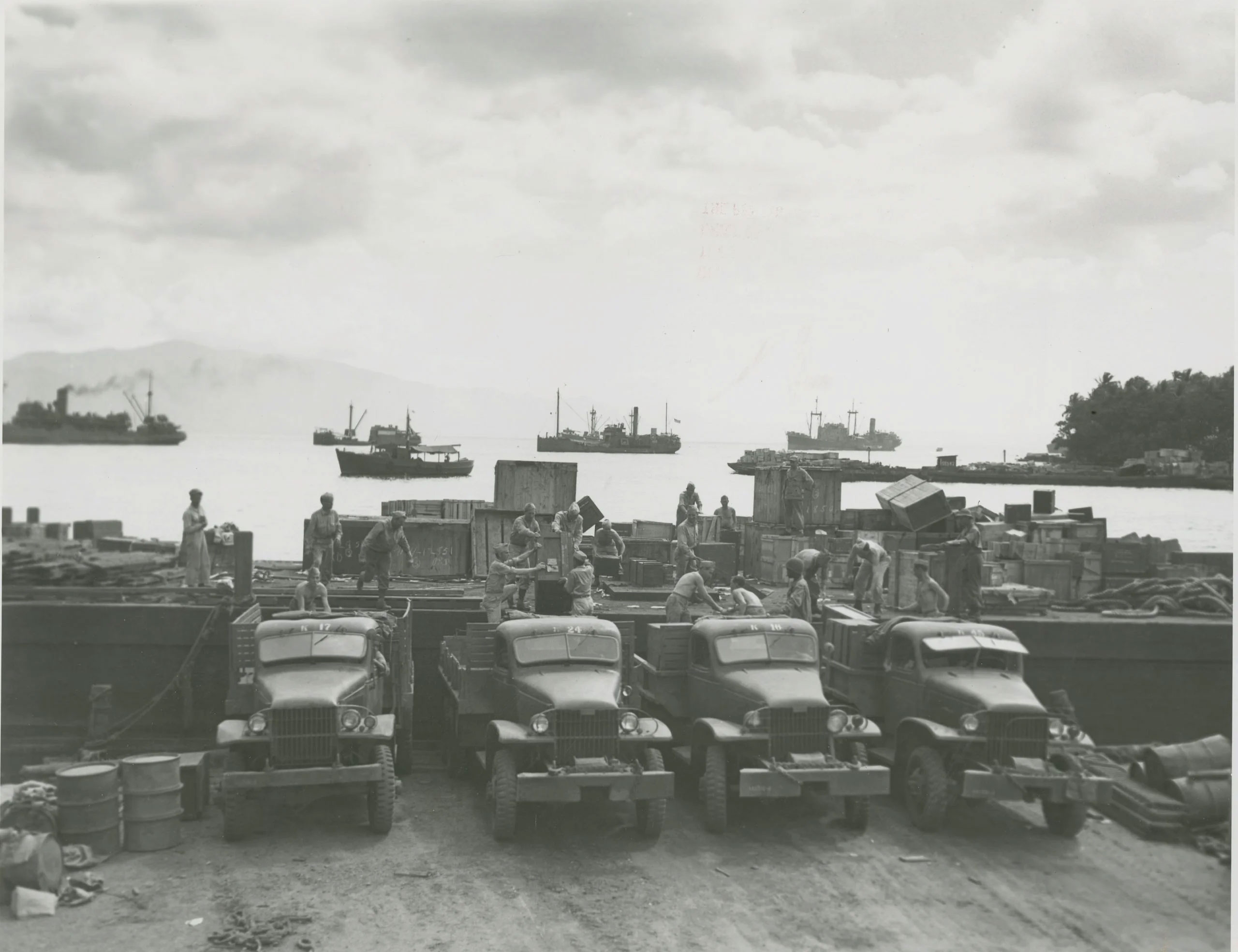 trucks during world war II unloading cargo